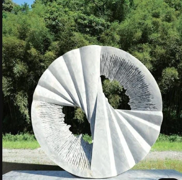  carved natural stone sculpture with fine detailing for interior and exterior decor